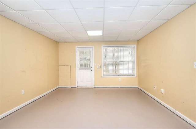 662 Shady Willow Ln, Loganville, GA 30052 - spare room featuring a drop ceiling and baseboards