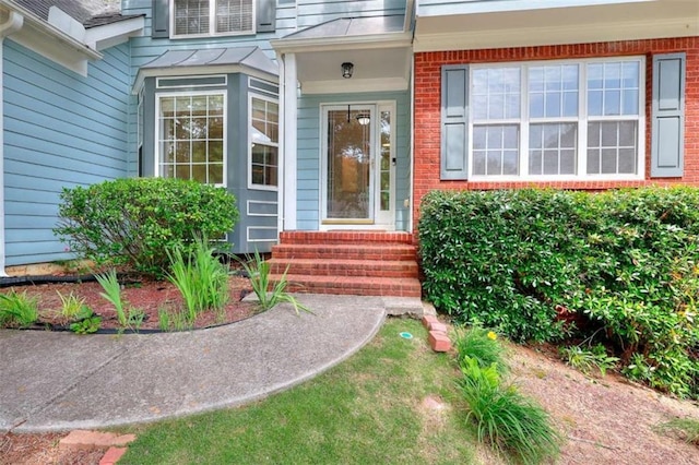 662 Shady Willow Ln, Loganville, GA 30052 - view of exterior entry featuring brick siding