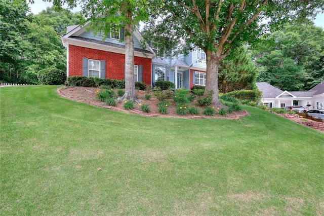 662 Shady Willow Ln, Loganville, GA 30052 - view of front of house featuring brick siding and a front yard