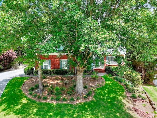 662 Shady Willow Ln, Loganville, GA 30052 - view of front of property with brick siding and a front yard