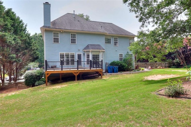 662 Shady Willow Ln, Loganville, GA 30052 - back of property featuring a deck and a chimney