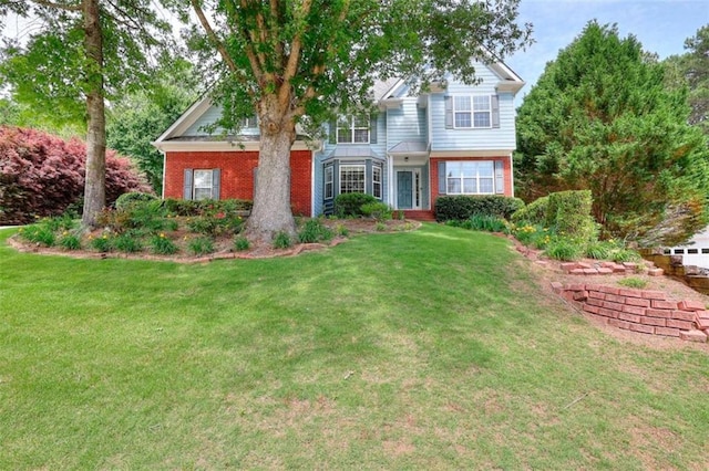 662 Shady Willow Ln, Loganville, GA 30052 - view of front of property featuring brick siding and a front lawn