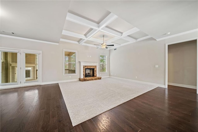 unfurnished living room with dark wood-style flooring, a ceiling fan, baseboards, and coffered ceiling