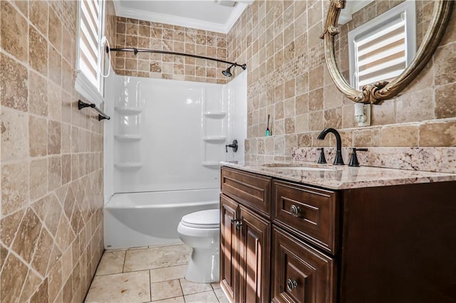 740 Creek Wind Ct, Duluth, GA 30097 - bathroom with tile walls, toilet, vanity, shower / tub combination, and crown molding