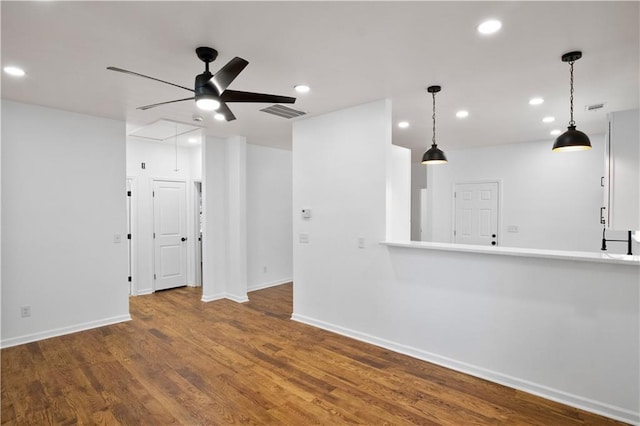 unfurnished living room with hardwood / wood-style floors