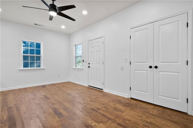 foyer featuring ceiling fan and hardwood / wood-style floors