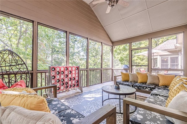 sunroom featuring lofted ceiling and a wealth of natural light