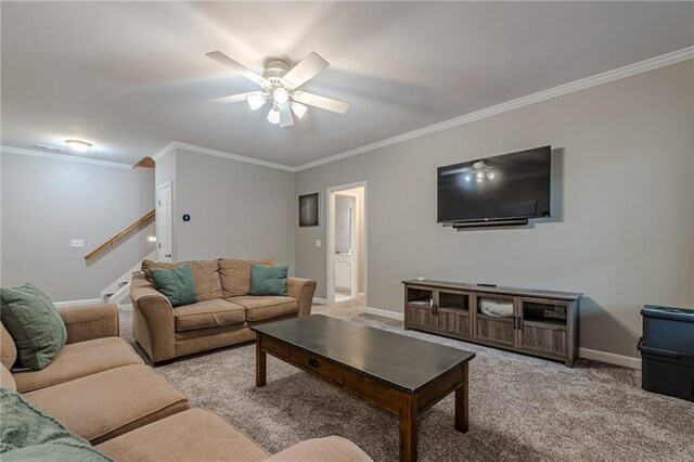 carpeted living room featuring crown molding and ceiling fan