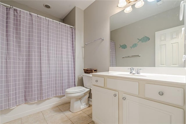 full bathroom featuring vanity, shower / bath combo, toilet, and tile patterned floors