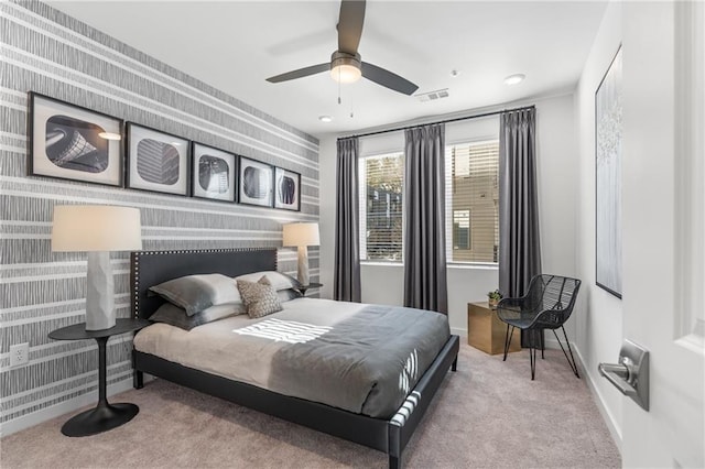 carpeted bedroom with ceiling fan