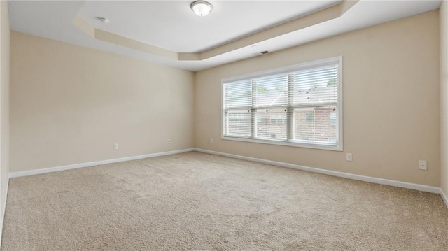 705 Ayala Pl, Alpharetta, GA 30004 - carpeted empty room with a tray ceiling and baseboards