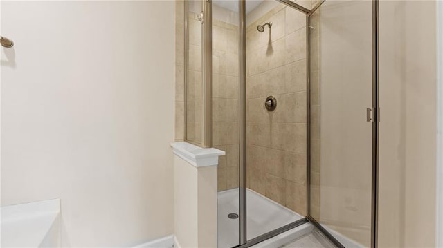 705 Ayala Pl, Alpharetta, GA 30004 - bathroom featuring baseboards and a shower stall