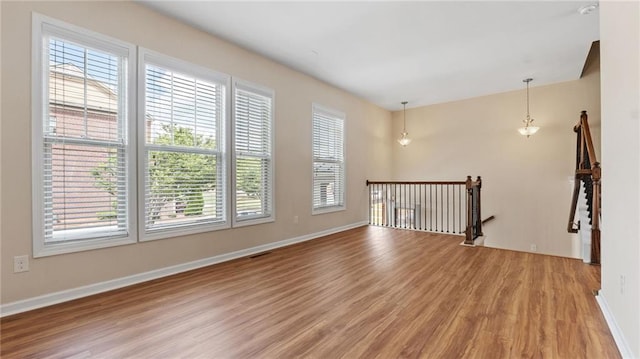 705 Ayala Pl, Alpharetta, GA 30004 - spare room featuring baseboards, light wood finished floors, and visible vents