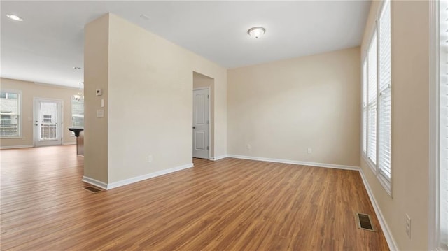 705 Ayala Pl, Alpharetta, GA 30004 - empty room with baseboards, wood finished floors, and visible vents