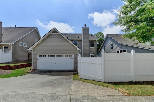 595 Stonepark Ln, Suwanee, GA 30024 - view of front facade with concrete driveway and a garage
