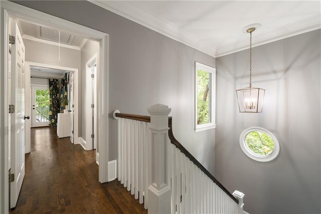 1003 N Ave NE, Atlanta, GA 30306 - corridor with an upstairs landing, attic access, dark wood-style flooring, a chandelier, and ornamental molding