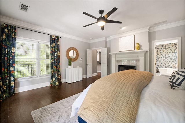 1003 N Ave NE, Atlanta, GA 30306 - bedroom featuring baseboards, crown molding, wood finished floors, a fireplace, and ceiling fan