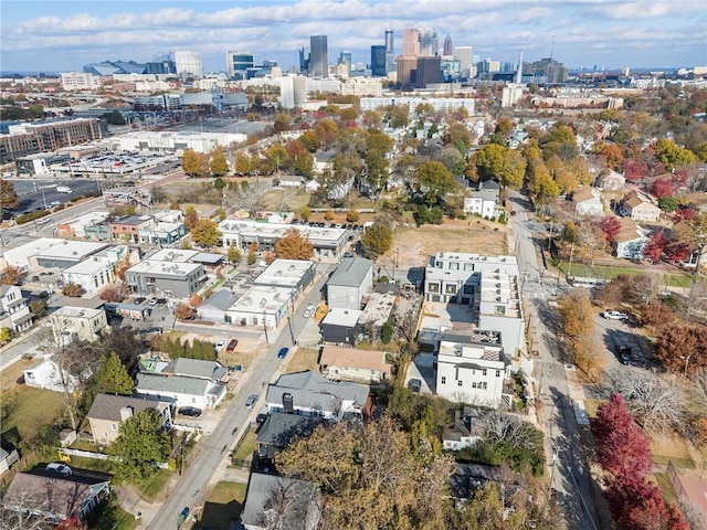 birds eye view of property with a city view