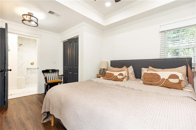 1443 Fama Dr NE, Atlanta, GA 30329 - bedroom featuring dark wood finished floors, ornamental molding, ensuite bath, and a closet