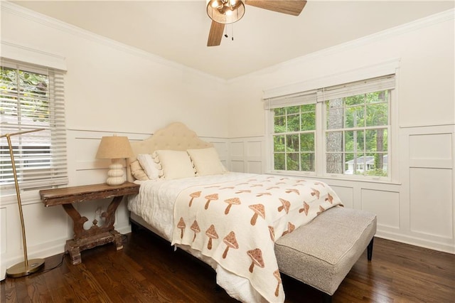 1443 Fama Dr NE, Atlanta, GA 30329 - bedroom featuring a decorative wall, ornamental molding, multiple windows, dark wood-type flooring, and a wainscoted wall