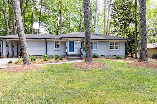 1443 Fama Dr NE, Atlanta, GA 30329 - view of front of house with a chimney, a front yard, a carport, and driveway