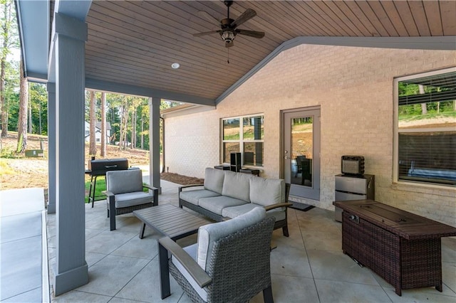 view of patio featuring ceiling fan and an outdoor living space