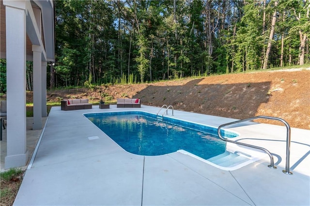 view of pool with an outdoor hangout area and a patio