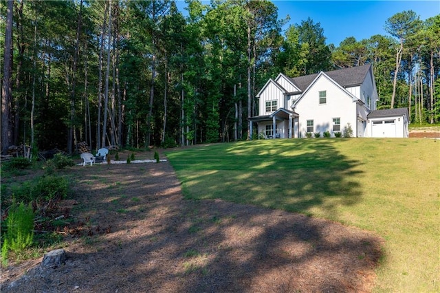 view of yard with a garage