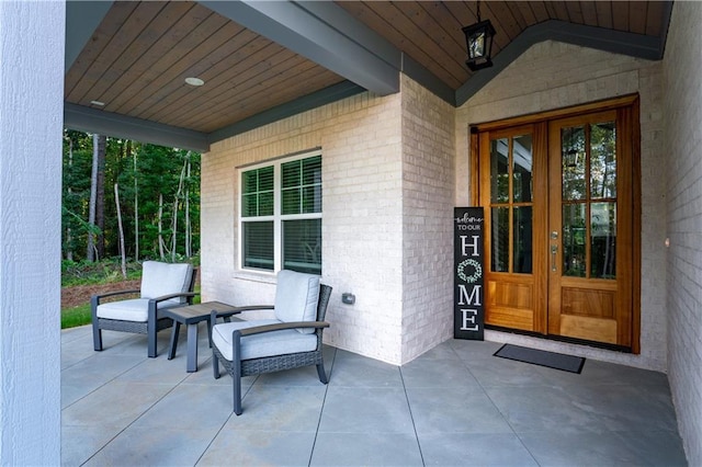 view of patio featuring french doors