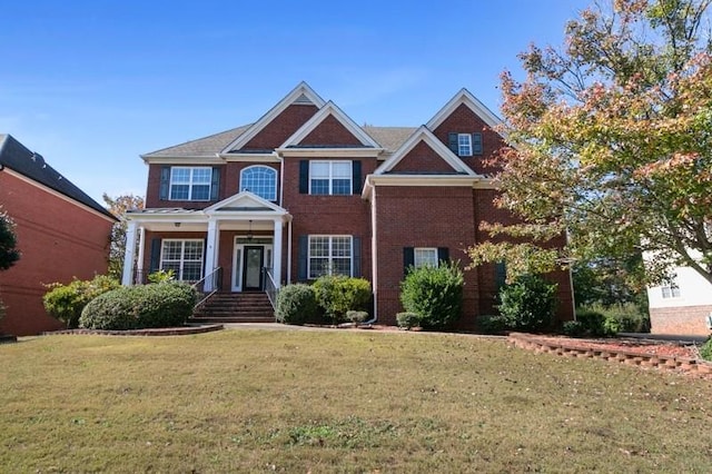 view of front of property featuring a front yard