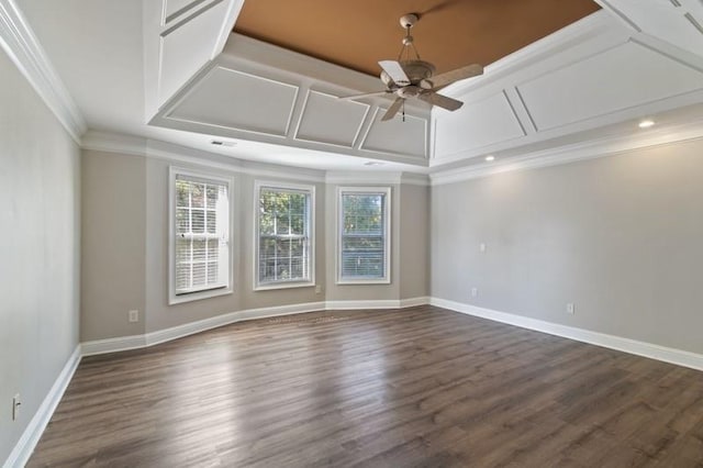 spare room with ceiling fan, ornamental molding, and dark hardwood / wood-style floors