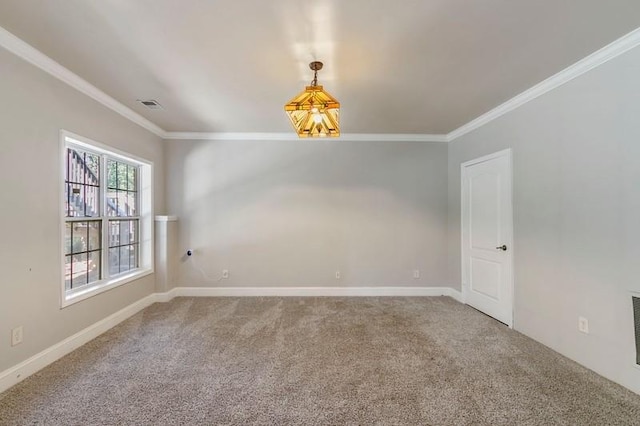 empty room with crown molding and carpet