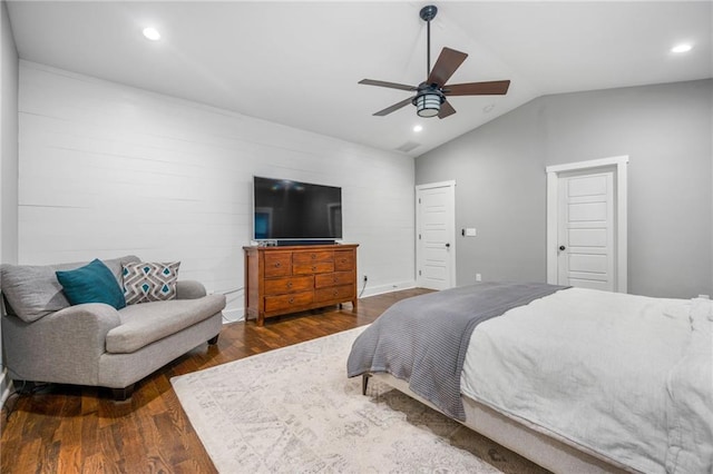 bedroom featuring dark wood-type flooring, ceiling fan, and lofted ceiling