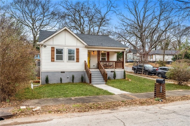 1375 Miller Reed Ave SE, Atlanta, GA 30315 - bungalow-style house with a porch, a shingled roof, a front lawn, and stairs