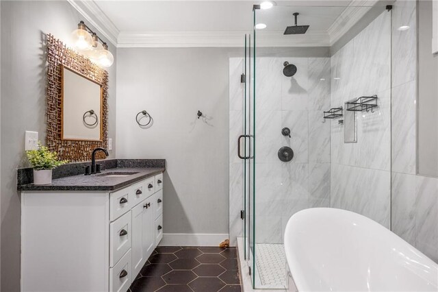 bathroom featuring crown molding, tile patterned floors, vanity, and a shower with shower door