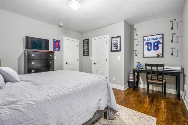 bedroom featuring dark hardwood / wood-style floors