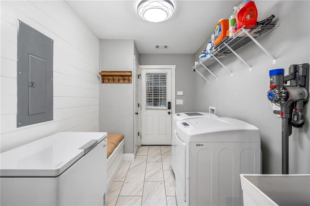 1375 Miller Reed Ave SE, Atlanta, GA 30315 - laundry area with laundry area, marble finish floor, visible vents, washing machine and dryer, and electric panel