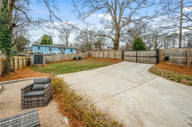 view of patio / terrace featuring a shed