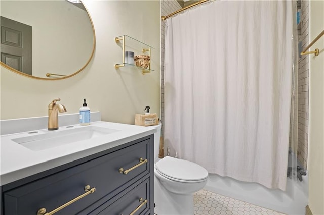 full bathroom with shower / bath combo with shower curtain, vanity, toilet, and tile patterned floors