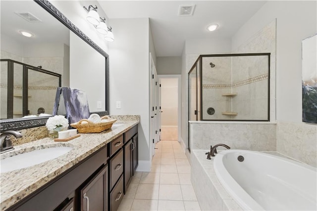 2828 Broughton Ln SE, Atlanta, GA 30339 - full bathroom with double vanity, a bath, a stall shower, and tile patterned floors