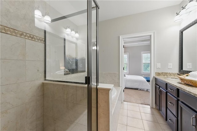 2828 Broughton Ln SE, Atlanta, GA 30339 - full bath with a stall shower, tile patterned floors, double vanity, a bath, and connected bathroom