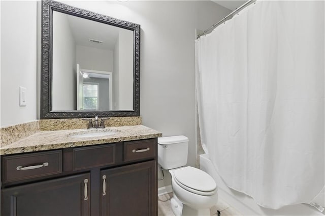 2828 Broughton Ln SE, Atlanta, GA 30339 - bathroom featuring vanity, toilet, and shower / tub combo