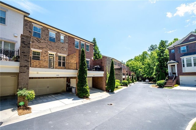 2828 Broughton Ln SE, Atlanta, GA 30339 - view of asphalt road featuring a residential view
