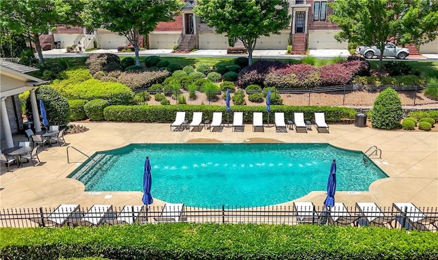2828 Broughton Ln SE, Atlanta, GA 30339 - community pool featuring a patio area