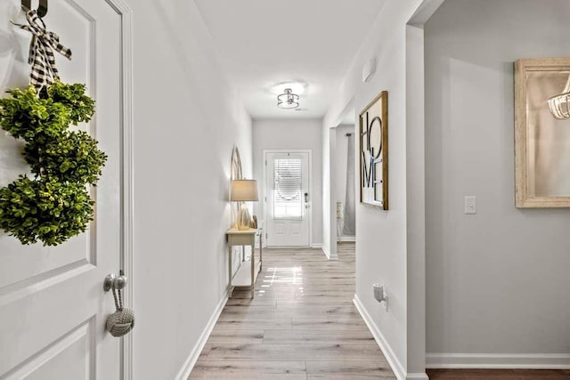 hallway with light wood-type flooring