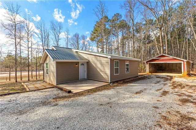 view of front of property with a carport