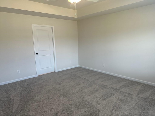 unfurnished room with carpet floors and ceiling fan