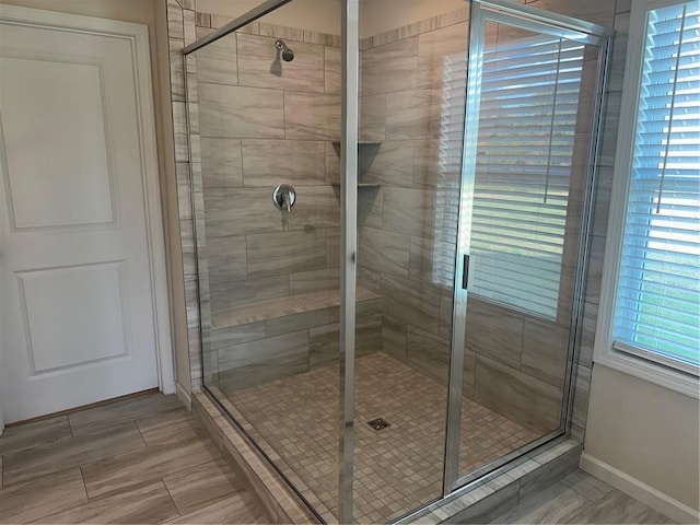 bathroom with an enclosed shower