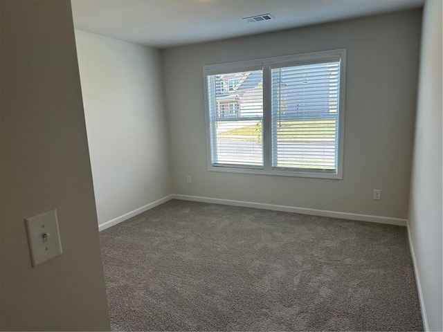 unfurnished room with carpet