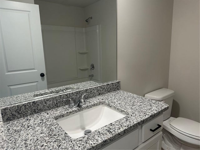 full bathroom featuring vanity, toilet, and shower / bath combination